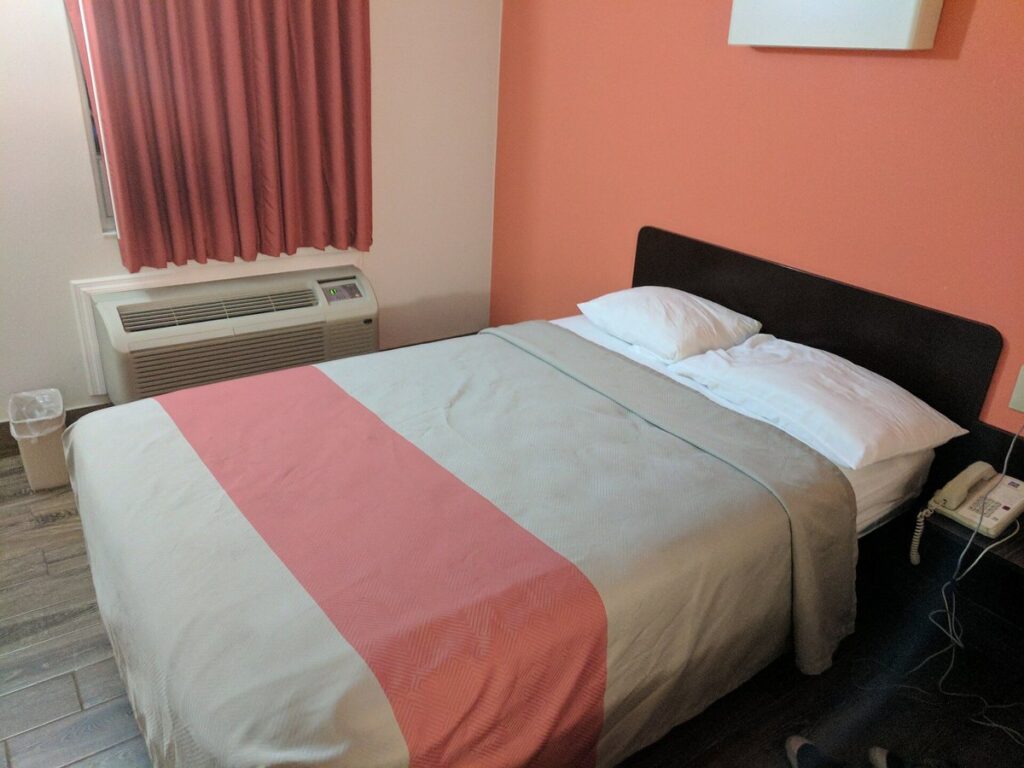 Bed in hotel room 4